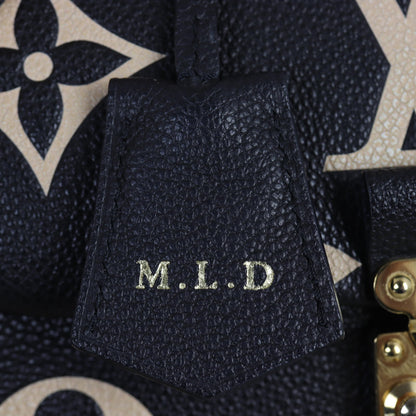 Louis Vuitton Madeleine BB Monogram Empreinte Giant Bicolour